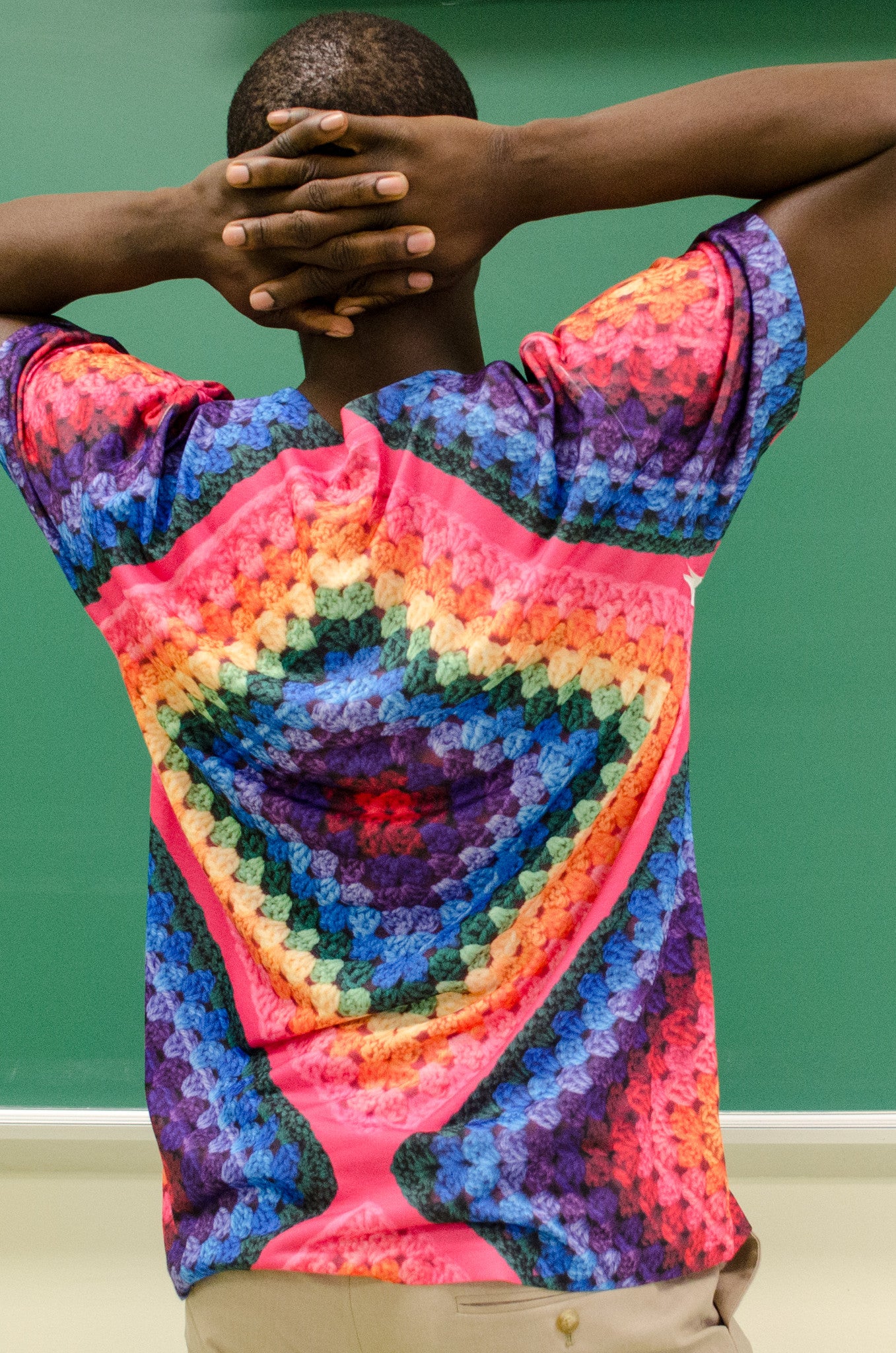Snapdragon Brand Clothing Granny Square Crochet Print rainbow tie-dye t-shirt in style Rainbow Soul features a vintage psychedelic hippie boho feel and a rainbow of colors. Made of comfortable polyester.