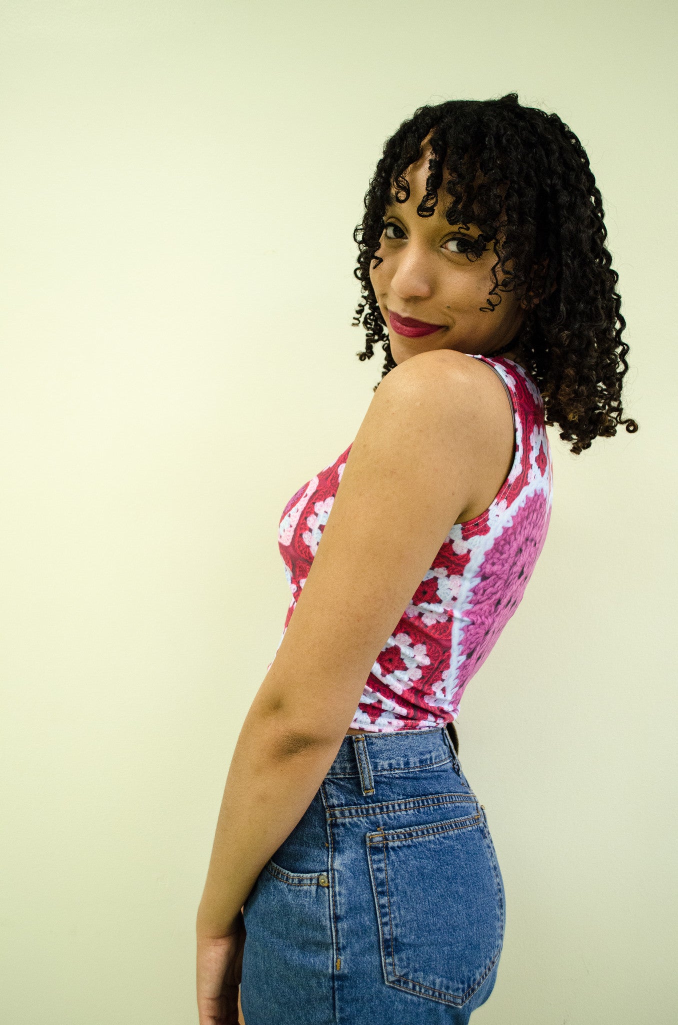 Snapdragon Brand Clothing Granny Square Crochet Print red crop top cropped sleeveless shirt in style Valentina features a vintage kawaii boho feel and the sweetest colors. Made of comfortable spandex. Daisies