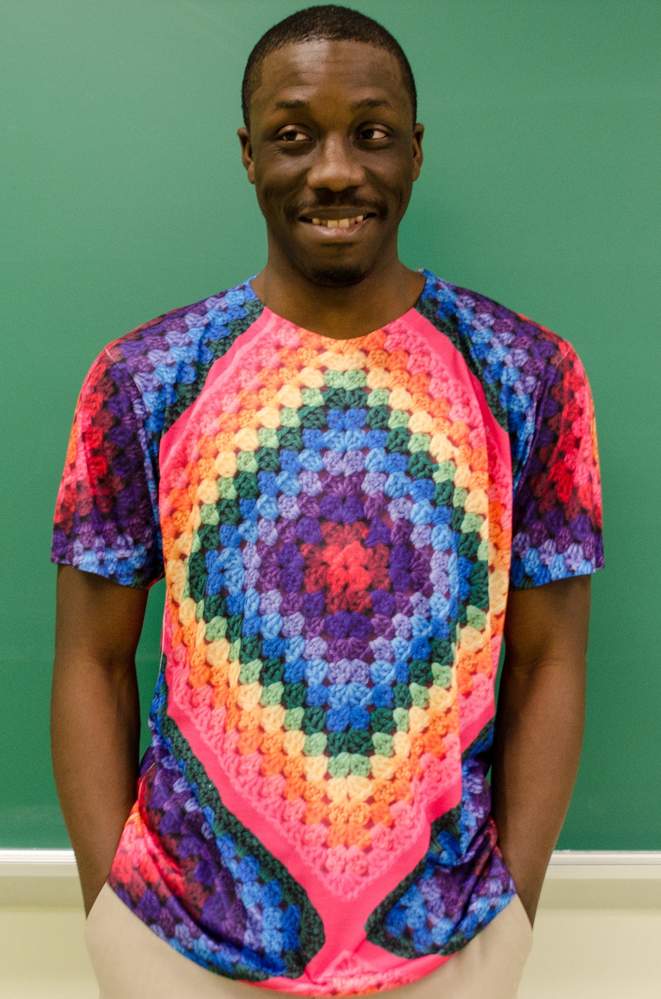 Snapdragon Brand Clothing Granny Square Crochet Print rainbow tie-dye t-shirt in style Rainbow Soul features a vintage psychedelic hippie boho feel and a rainbow of colors. Made of comfortable polyester.