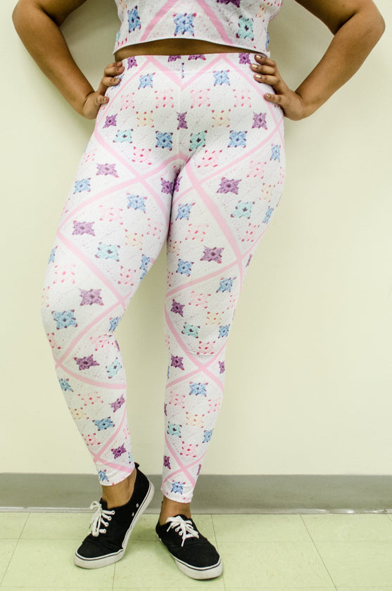 Snapdragon Brand Clothing Granny Square Crochet Print pink and white leggings in style Pretty Baby features a Melanie Martinez boho feel and a pastel rainbow of colors. Made of comfortable spandex.